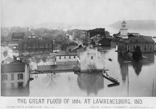 Black and white photograph showing a flooded town; caption reads: 'The Great Flood of 1884, at Lawrenceburg, Ind.'